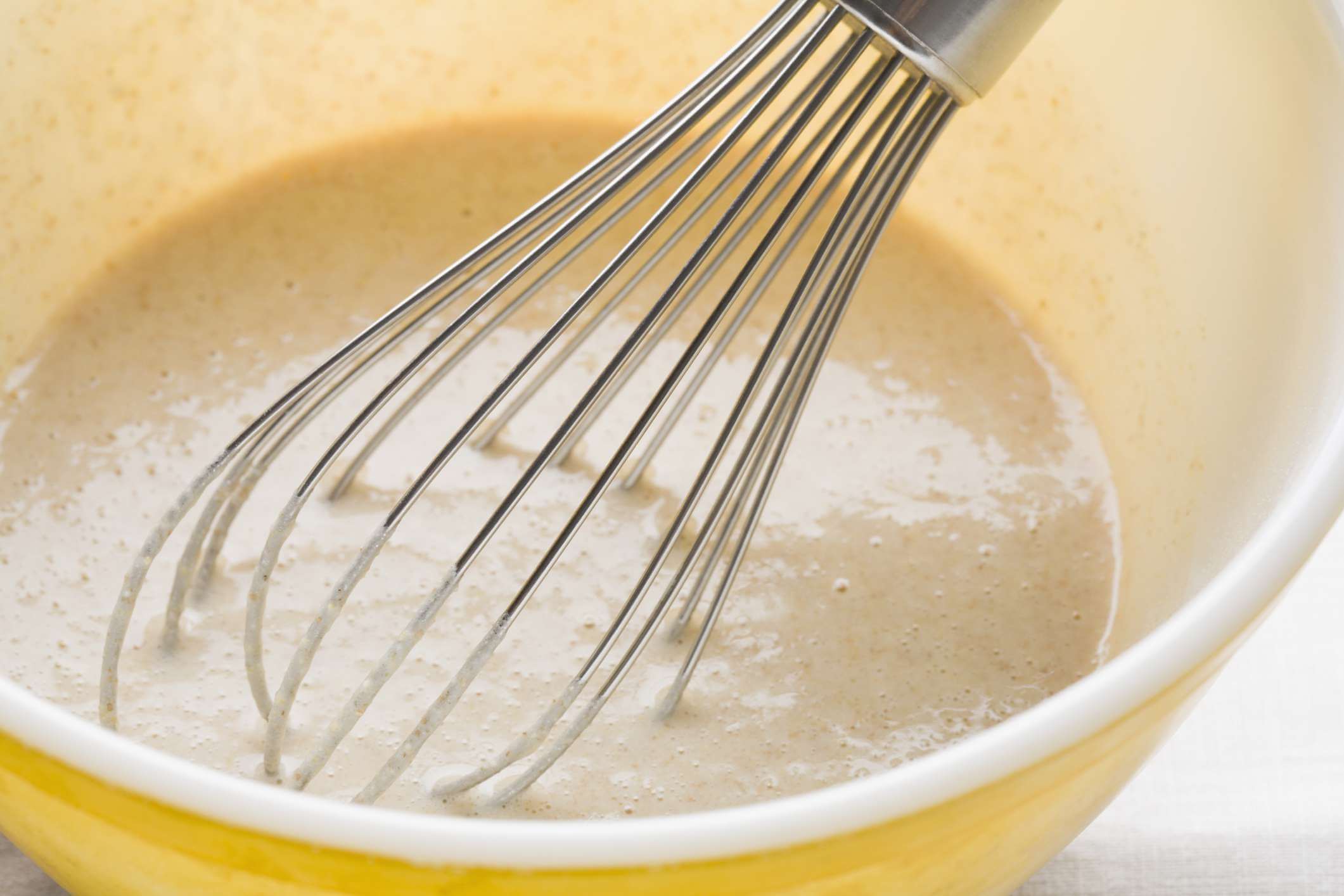 A whisk is used to mix a batter